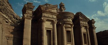 Movie still from “Transformers: Revenge of the Fallen” (2009), directed by Michael Bay – A building that has pillars on the side of it; Extreme Wide shot, Low angle