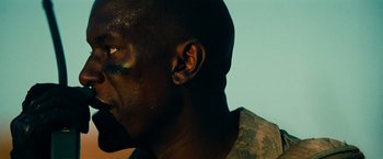 Movie still from “Transformers: Revenge of the Fallen” (2009), directed by Michael Bay – A person's face with makeup on; Close Up shot, Low angle