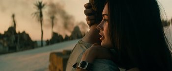 Movie still from “Transformers: Revenge of the Fallen” (2009), directed by Michael Bay – A man and a woman standing next to each other; Close Up shot, Over the shoulder angle