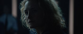 Movie still from “Troll” (2022), directed by Roar Uthaug – A person with long blonde hair; Close Up shot, Low angle