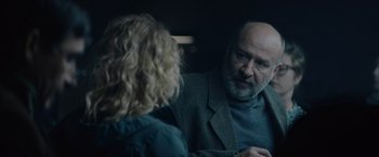 Movie still from “Troll” (2022), directed by Roar Uthaug – A man and a woman are talking in a car; Close Up shot, Over the shoulder angle