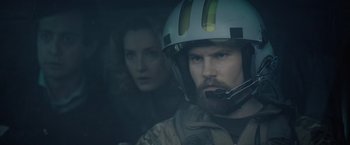 Movie still from “Troll” (2022), directed by Roar Uthaug – A man and a woman in a vehicle; Close Up shot, Over the shoulder angle