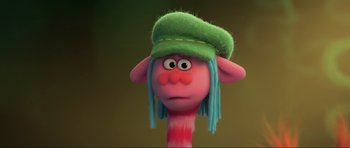 Movie still from “Trolls World Tour” (2020), directed by Walt Dohrn – A cartoon character is wearing a green hat; Close Up shot, High angle