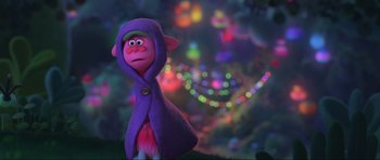 Movie still from “Trolls World Tour” (2020), directed by Walt Dohrn – A stuffed animal wearing a purple hooded jacket; Medium shot, Over the shoulder angle
