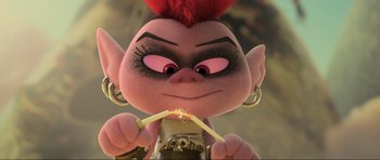 Movie still from “Trolls World Tour” (2020), directed by Walt Dohrn – A stuffed animal with a sparkler in its mouth; Close Up shot, High angle