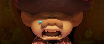 Movie still from “Trolls World Tour” (2020), directed by Walt Dohrn – An animated bear crying with a tear in his eye; Close Up shot, Low angle