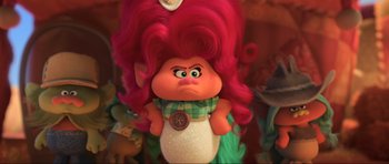 Movie still from “Trolls World Tour” (2020), directed by Walt Dohrn – A troll doll with pink hair; Medium shot, Over the shoulder angle