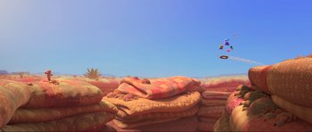 Movie still from “Trolls World Tour” (2020), directed by Walt Dohrn – A pile of blankets on top of a pile of bags; Extreme Wide shot, Low angle