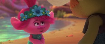 Movie still from “Trolls World Tour” (2020), directed by Walt Dohrn – A character in a scene from trolls world tour; Close Up shot, Over the shoulder angle