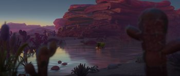 Movie still from “Trolls World Tour” (2020), directed by Walt Dohrn – An image of an animal in the middle of the water; Extreme Wide shot, High angle