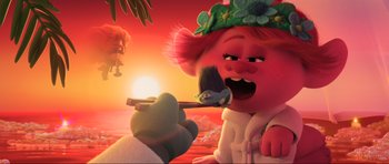 Movie still from “Trolls World Tour” (2020), directed by Walt Dohrn – A person is painting a troll on a brush; Medium shot, Over the shoulder angle