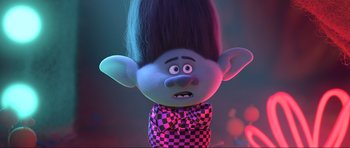 Movie still from “Trolls World Tour” (2020), directed by Walt Dohrn – A troll doll with a checkered shirt; Close Up shot, Over the shoulder angle
