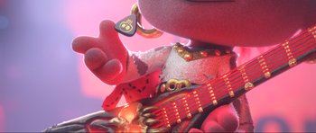 Movie still from “Trolls World Tour” (2020), directed by Walt Dohrn – A person holding a toy guitar; Extreme Close Up shot, Low angle