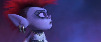 Movie still from “Trolls World Tour” (2020), directed by Walt Dohrn – A doll with red hair; Close Up shot, High angle