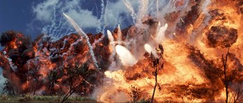 Movie still from “Tropic Thunder” (2008), directed by Ben Stiller – A bunch of smoke coming out of a fire; Extreme Wide shot, High angle