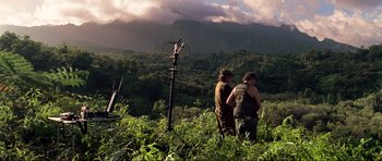 Movie still from “Tropic Thunder” (2008), directed by Ben Stiller – Two people standing in a field looking out at the mountains; Wide shot, Low angle