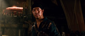 Movie still from “Tropic Thunder” (2008), directed by Ben Stiller – A person wearing a hat; Close Up shot, Over the shoulder angle