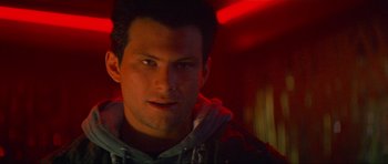 Movie still from “True Romance” (1993), directed by Tony Scott – A person wearing a hooded sweatshirt; Close Up shot, Low angle