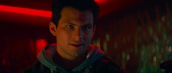 Movie still from “True Romance” (1993), directed by Tony Scott – A person wearing a hooded sweatshirt; Close Up shot, Low angle