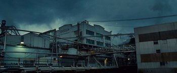Movie still from “Twilight” (2008), directed by Catherine Hardwicke – A building with a crane in front of it; Extreme Wide shot, Low angle