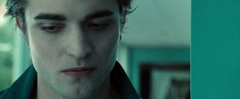 Movie still from “Twilight” (2008), directed by Catherine Hardwicke – A man's face in a room; Close Up shot, Over the shoulder angle