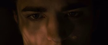 Movie still from “Twilight” (2008), directed by Catherine Hardwicke – A man's eyes in the dark; Extreme Close Up shot, Overhead angle