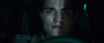 Movie still from “Twilight” (2008), directed by Catherine Hardwicke – A person in a car looking at the camera; Close Up shot, High angle