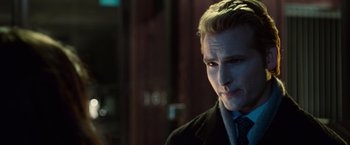 Movie still from “Twilight” (2008), directed by Catherine Hardwicke – A person wearing a suit and tie; Close Up shot, Over the shoulder angle