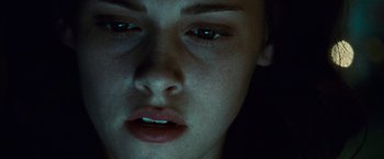 Movie still from “Twilight” (2008), directed by Catherine Hardwicke – A person's face at night; Extreme Close Up shot, Overhead angle