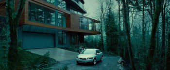 Movie still from “Twilight” (2008), directed by Catherine Hardwicke – A car parked in front of a house; Wide shot, Low angle