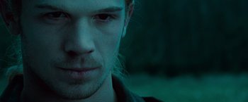 Movie still from “Twilight” (2008), directed by Catherine Hardwicke – A man's face in the dark; Close Up shot, Low angle
