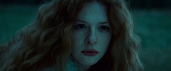 Movie still from “Twilight” (2008), directed by Catherine Hardwicke – A woman's face in the dark; Close Up shot, Low angle