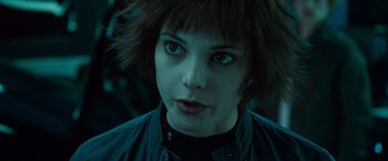 Movie still from “Twilight” (2008), directed by Catherine Hardwicke – A person with short brown hair; Close Up shot, Over the shoulder angle