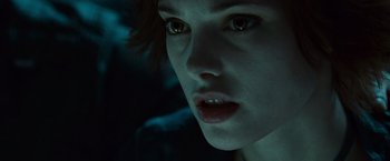 Movie still from “Twilight” (2008), directed by Catherine Hardwicke – A woman's face in the dark; Close Up shot, Over the shoulder angle