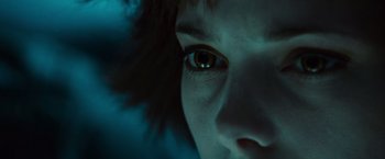 Movie still from “Twilight” (2008), directed by Catherine Hardwicke – A person's eyes in the dark; Extreme Close Up shot, Low angle