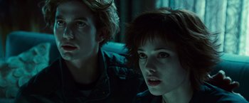 Movie still from “Twilight” (2008), directed by Catherine Hardwicke – A man and a woman sitting next to each other; Close Up shot, Low angle