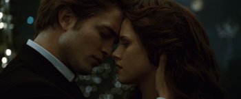 Movie still from “Twilight” (2008), directed by Catherine Hardwicke – A man and a woman face to face with their eyes closed; Close Up shot, Low angle