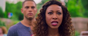 Movie still from “Tyler Perry's A Madea Homecoming” (2022), directed by Tyler Perry – A woman and a man standing next to each other; Close Up shot, Over the shoulder angle