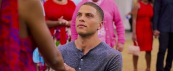 Movie still from “Tyler Perry's A Madea Homecoming” (2022), directed by Tyler Perry – A young man is looking up at something in front of him; Close Up shot, Over the shoulder angle