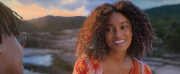 A beautiful young woman with a smile on her face