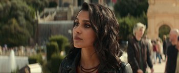 Movie still from “Uncharted” (2022), directed by Ruben Fleischer – A person wearing a leather jacket; Close Up shot, Over the shoulder angle