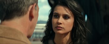 Movie still from “Uncharted” (2022), directed by Ruben Fleischer – A person talking to another person; Close Up shot, Over the shoulder angle