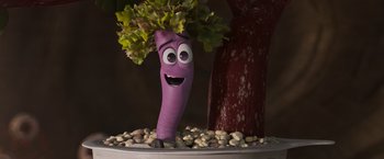 Movie still from “Under the Boardwalk” (2023), directed by David Soren – A purple plant with leaves growing on it's head; Close Up shot, High angle