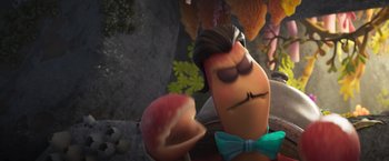 Movie still from “Under the Boardwalk” (2023), directed by David Soren – An image of an animated character eating an apple; Close Up shot, Over the shoulder angle