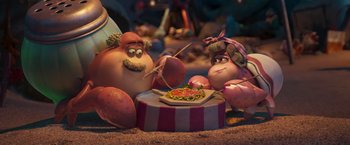 Movie still from “Under the Boardwalk” (2023), directed by David Soren – A couple of characters sitting next to each other eating food; Wide shot, High angle
