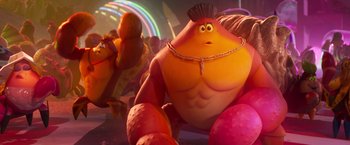 Movie still from “Under the Boardwalk” (2023), directed by David Soren – A person in a circus setting; Medium shot, Low angle