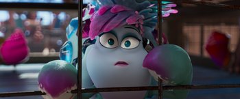 Movie still from “Under the Boardwalk” (2023), directed by David Soren – A person's face behind bars; Close Up shot, Low angle