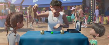 Movie still from “Under the Boardwalk” (2023), directed by David Soren – An animated character is playing with a ball; Close Up shot, Over the shoulder angle