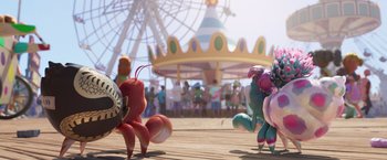 Movie still from “Under the Boardwalk” (2023), directed by David Soren – A group of people standing on top of a wooden deck; Wide shot, High angle