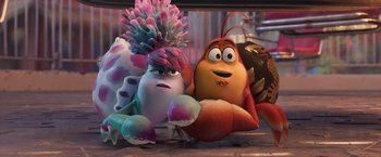 Movie still from “Under the Boardwalk” (2023), directed by David Soren – A couple of characters sitting next to each other on top of a table; Medium shot, Over the shoulder angle